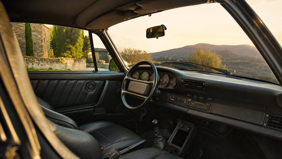 Air-cooled sports car interior with round dials, evening light