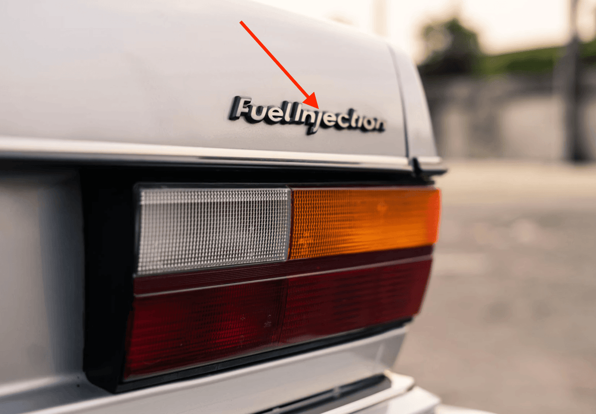 Audi 80 / 90 / 100 / 200 / 4000 / 5000 C3 “Fuel Injection” Emblem Badge Black — view 4