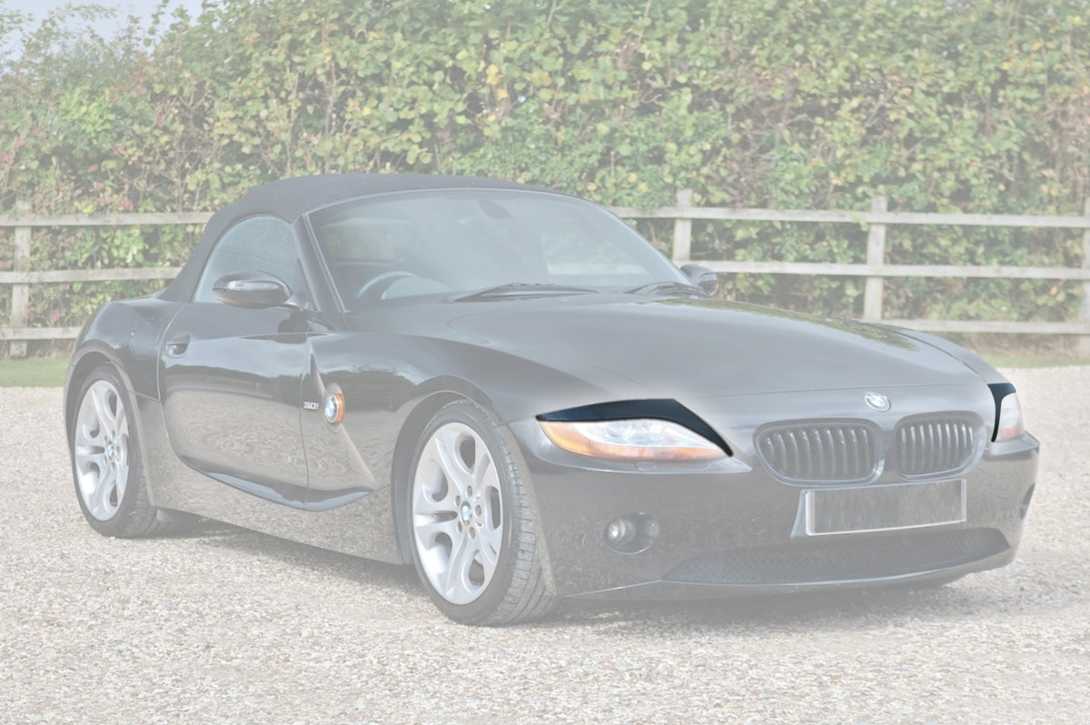 BMW Z4 E85 / E86 Arched Headlight Eyebrow “Bad Look” Trims Black / Primed — view 2